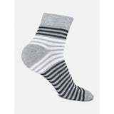 Assorted cotton-blended mid-calf print socks for men, vibrant colors and patterns on display