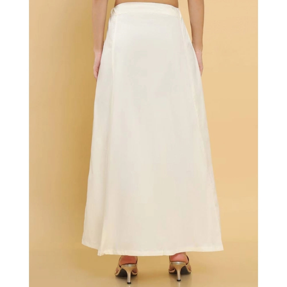Cream cotton solid petticoat for women's shapewear, full length, on model