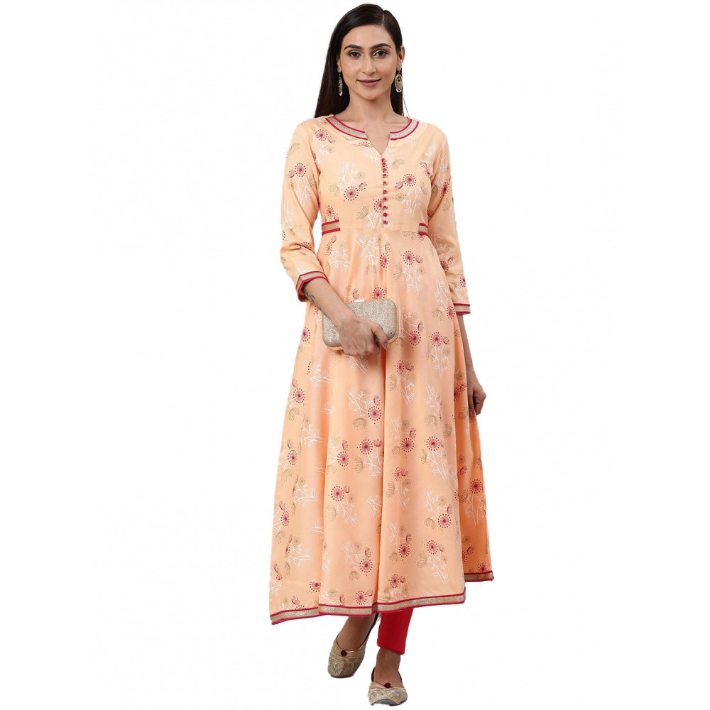 Peach rayon women's casual 3/4 sleeve floral printed kurti with V-neck collar and knee length, display on mannequin