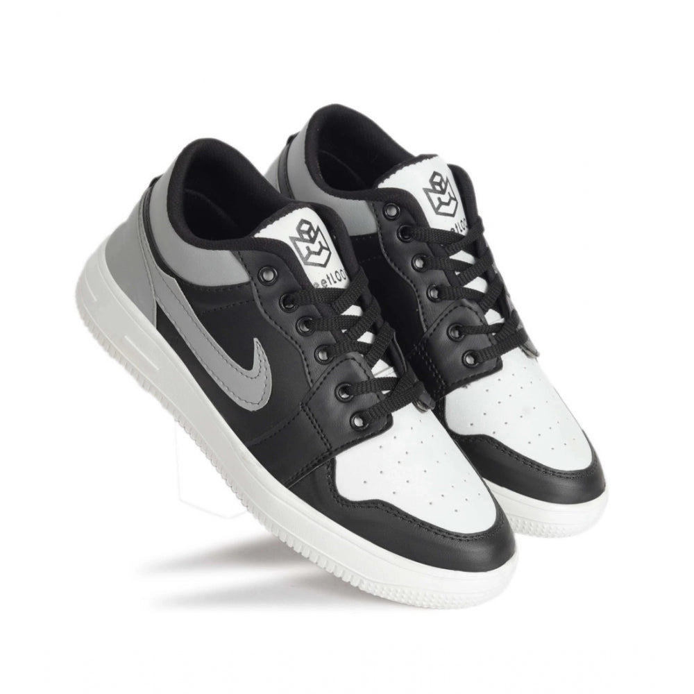 Black synthetic men's casual shoes with lace-up closure, ideal for everyday wear