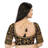 Black velvet embroidered blouse, free size, half sleeves, sweetheart neckline on display