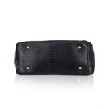 Black faux leather textured tote bag with zipper closure and dual handles