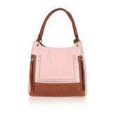Pink faux leather printed tote bag with zipper closure and dual handle, featuring a patterned design