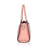 Pink faux leather textured adjustable long belt handbag with dual handles, patterned detailing, and zipper closure