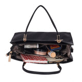 Black faux leather textured adjustable long belt handbag with dual handle, zipper closure