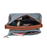 Blue faux leather textured sling bag with dual handle, synthetic lining and zipper closure