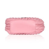 Pink faux leather textured handbag with dual handle and zipper closure