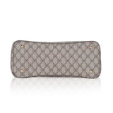 Beige faux leather printed handbag with dual handles and zipper closure