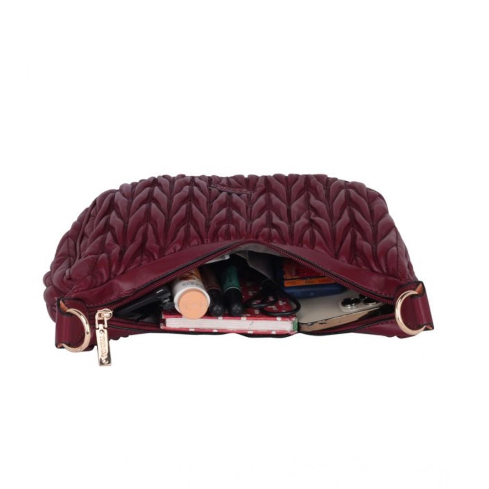 Red faux leather textured handbag with dual handles and zipper closure