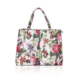 White pink faux leather printed handheld bag with dual handle, synthetic lining, and zipper closure