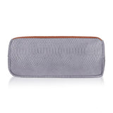 Blue faux leather textured tote bag with dual handle, synthetic inner material, and zipper closure