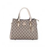 Beige faux leather printed handbag with dual handle, synthetic lining, zipper closure - fashion accessory for women on display stand