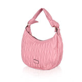 Pink faux leather textured handbag with dual handle and zipper closure