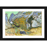 Multi-colored wood framed painting depicting a ravine with a small stream, suitable for wall mounting
