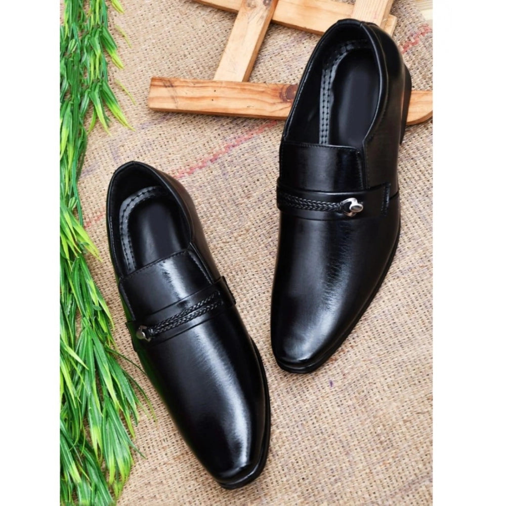 Black faux leather men's slip-on formal shoes, ideal for a smart occasion