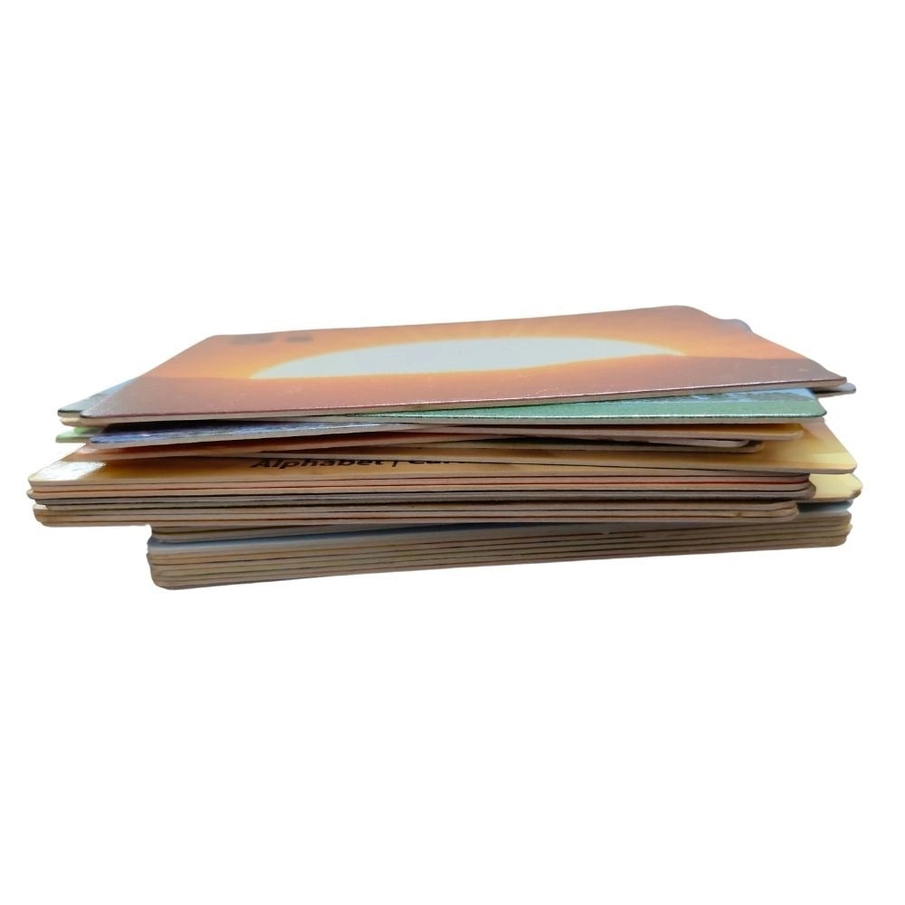 Assorted cardboard Alphapet Flash cards for educational toys, promoting learning for babies 0-12 months