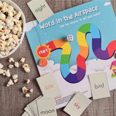 Multi-colored wooden Words in the Air Space board game, 10x10 inches