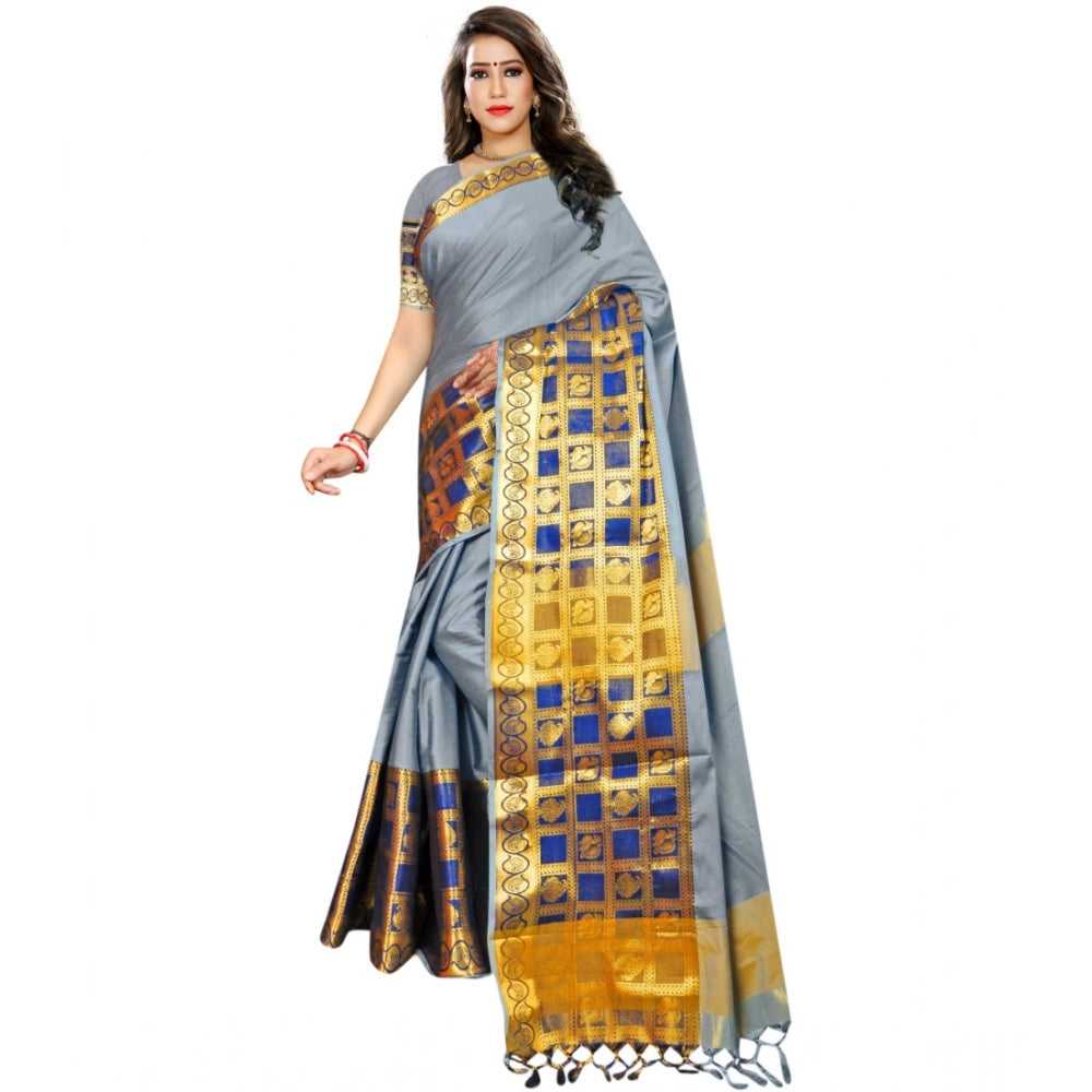 Light blue jacquard woven saree with unstitched blouse, intricate pattern on traditional Indian wear