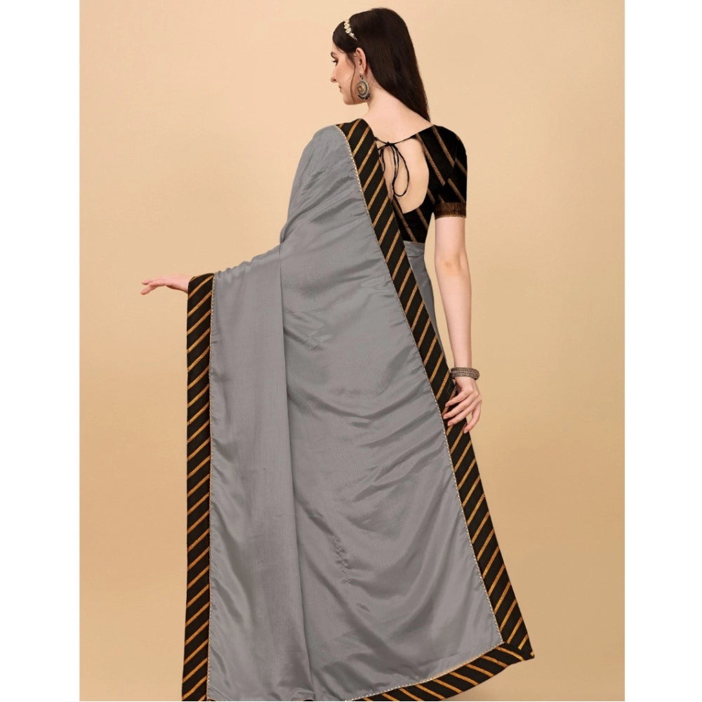 Silver chiffon self-design saree with unstitched blouse, elegant women's fashion accessory on mannequin
