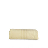 Cream cotton solid bath towels (35x71in), soft and absorbent for spa-like comfort at home