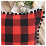 Red and black cotton checkered cushion cover with pom-pom (size: 12x20in)