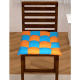 Beige and orange cotton-blended solid chair cushions (16x16in), complements living space interiors