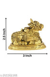 Brass Nandi statue, intricately detailed animal figurine, traditional South Indian decorative item for home or office