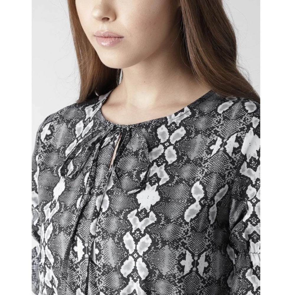 Black & White animal print polyester short sleeve knee-length dress for women on mannequin