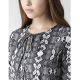 Black & White animal print polyester short sleeve knee-length dress for women on mannequin