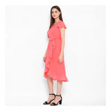 Coral pink polyester ruffled cap sleeve below knee dress for women on fashion mannequin