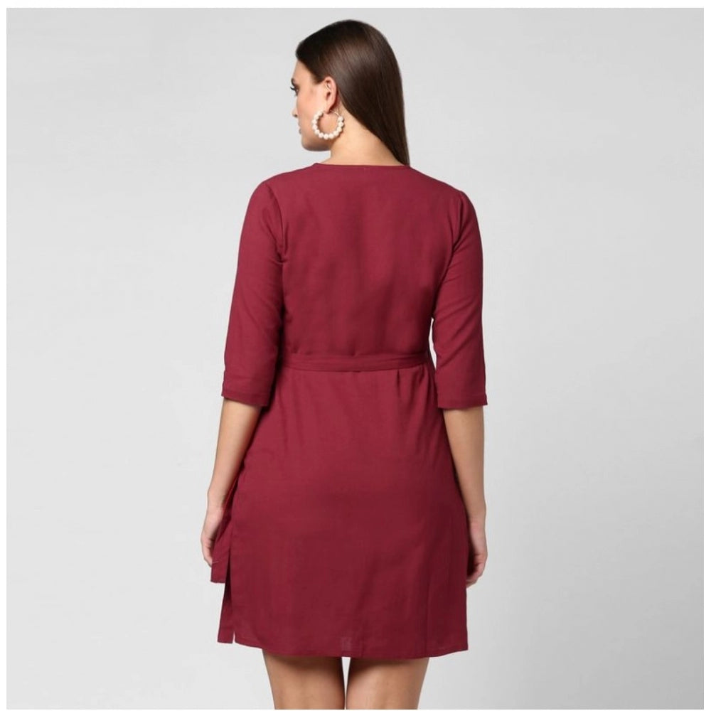 Maroon cotton 3/4 sleeve women's dress, solid design with v-neck, above knee length on mannequin