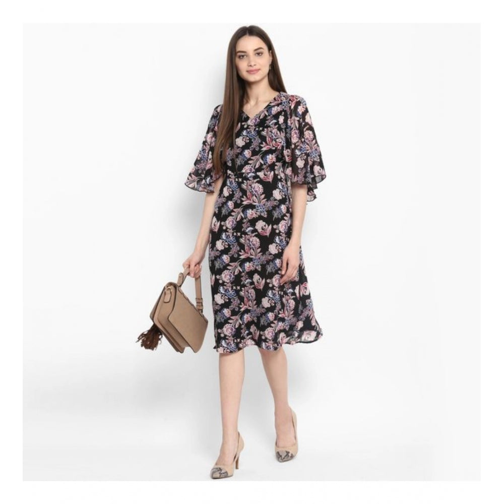 Black & multicolor polyester floral short sleeve knee-length dress on mannequin