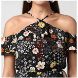 Black polyester floral cold shoulder above knee dress with halter neck, floral pattern visible