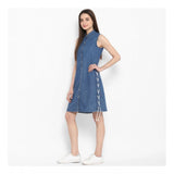 Blue denim solid sleeveless above-knee dress for women on model, fashionable summer outfit