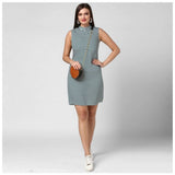 Green striped polyester sleeveless dress for women, above-knee length on mannequin