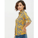 Mustard polyester printed roll-up sleeve standard length shirt for women, detailed image of vibrant design on front