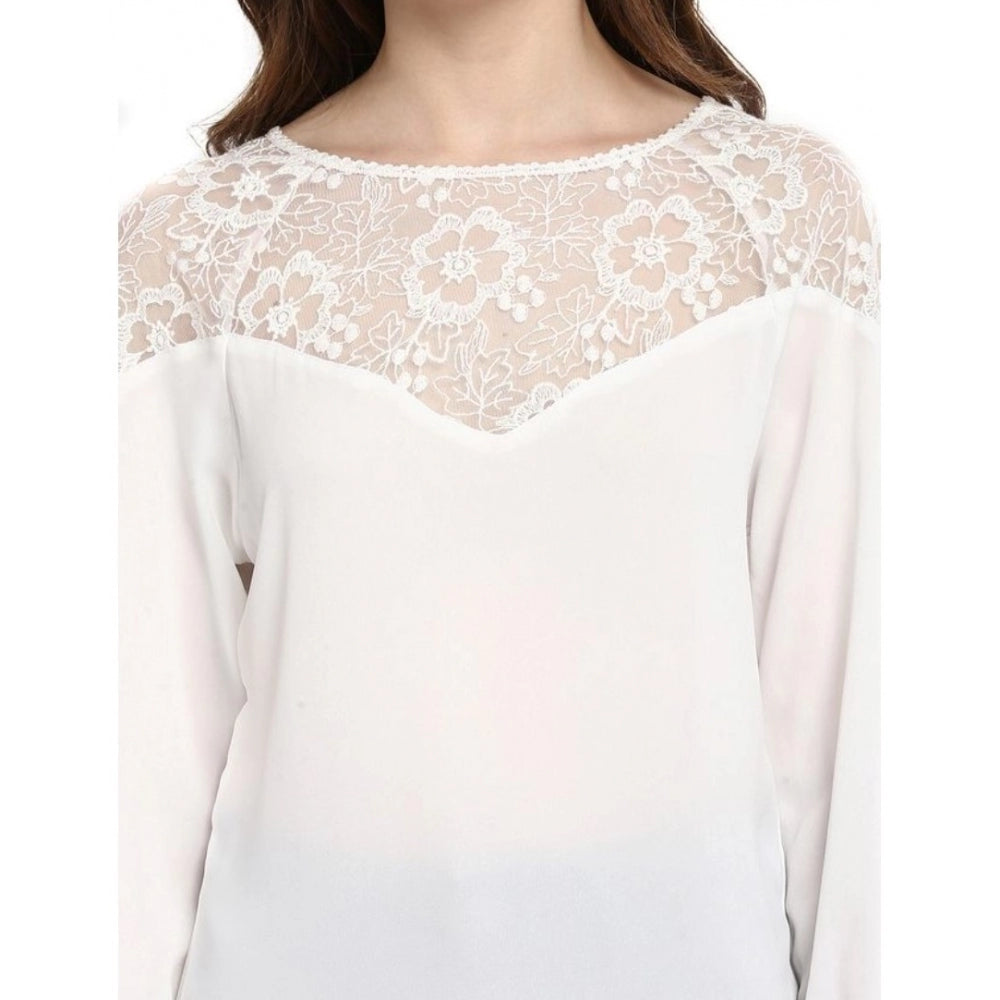 White polyester georgette self-design regular top with 3/4th sleeves, round neck on model