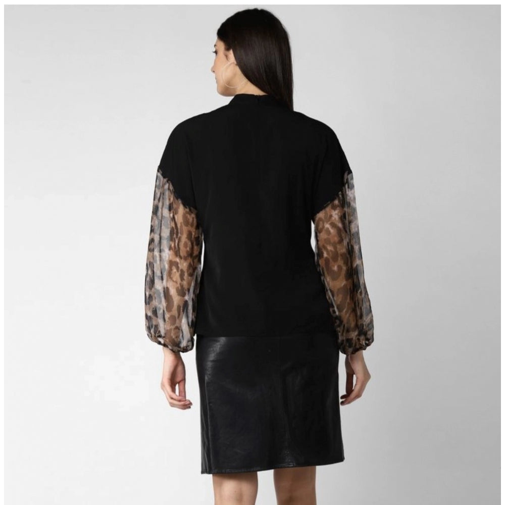 Black polyester animal print long sleeves top for women's fashion, close-up view