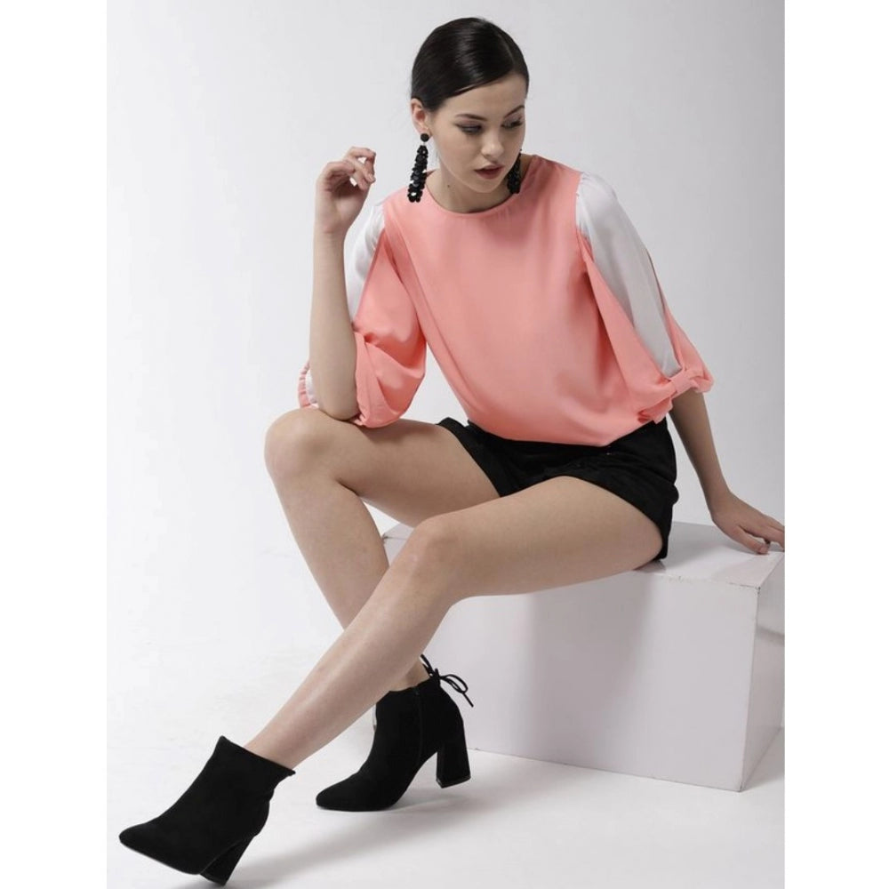 Pink polyester colour block slit sleeve top for women's fashion, round neck, vibrant hue on display