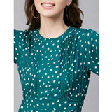 Green & White polyester polka long sleeves above knee dress on mannequin