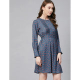 Grey & Coral polka long-sleeve dress with round neck, above knee length on model