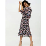 Multicolor polyester chain print cap sleeve calf-length dress with v-neck, on model