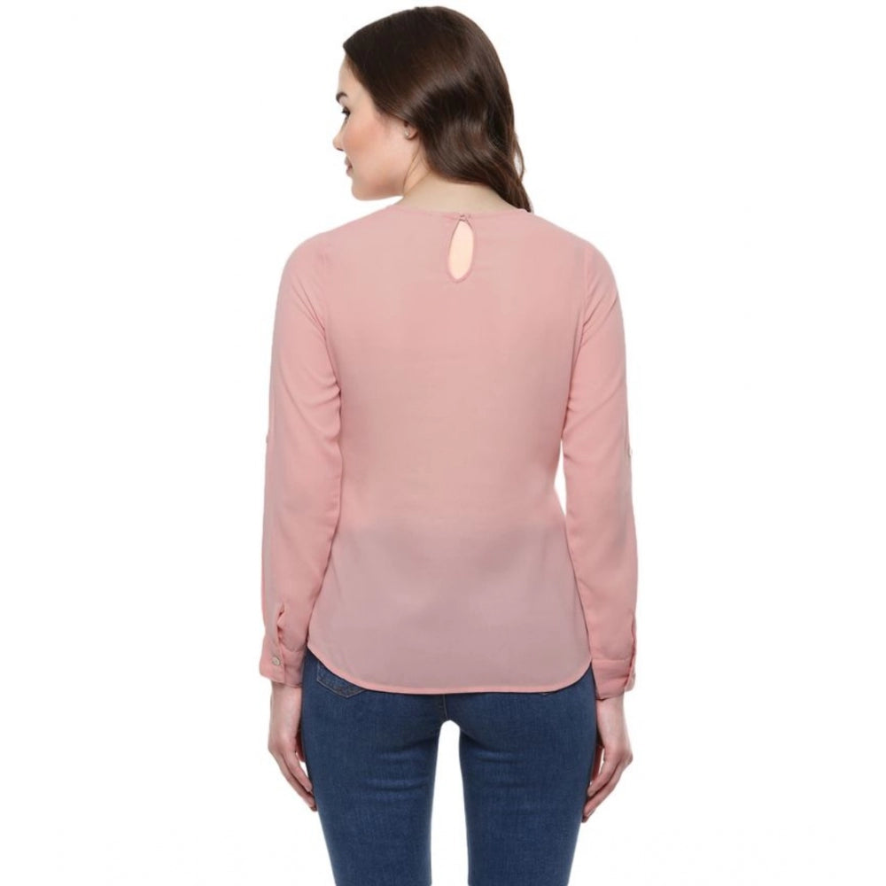 Pink polyester long-sleeve regular top, solid design on model