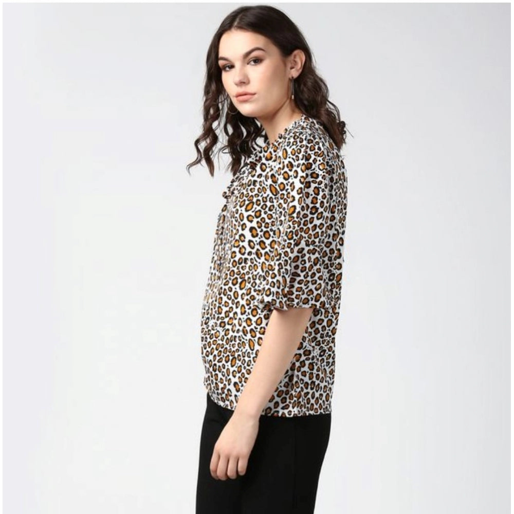 Orange & black animal print bell sleeve top on model, women's polyester fashion
