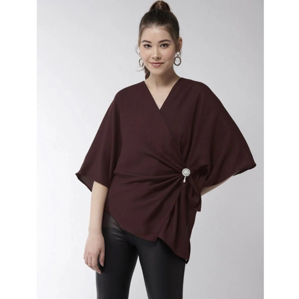 Maroon polyester solid cape sleeve top for women, vivid v-neck style on display