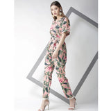 Pink polyester floral half sleeve jumpsuit with V neck, ideal for spring/summer fashion