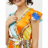 Multicolor satin chain print cap sleeve calf-length dress on model