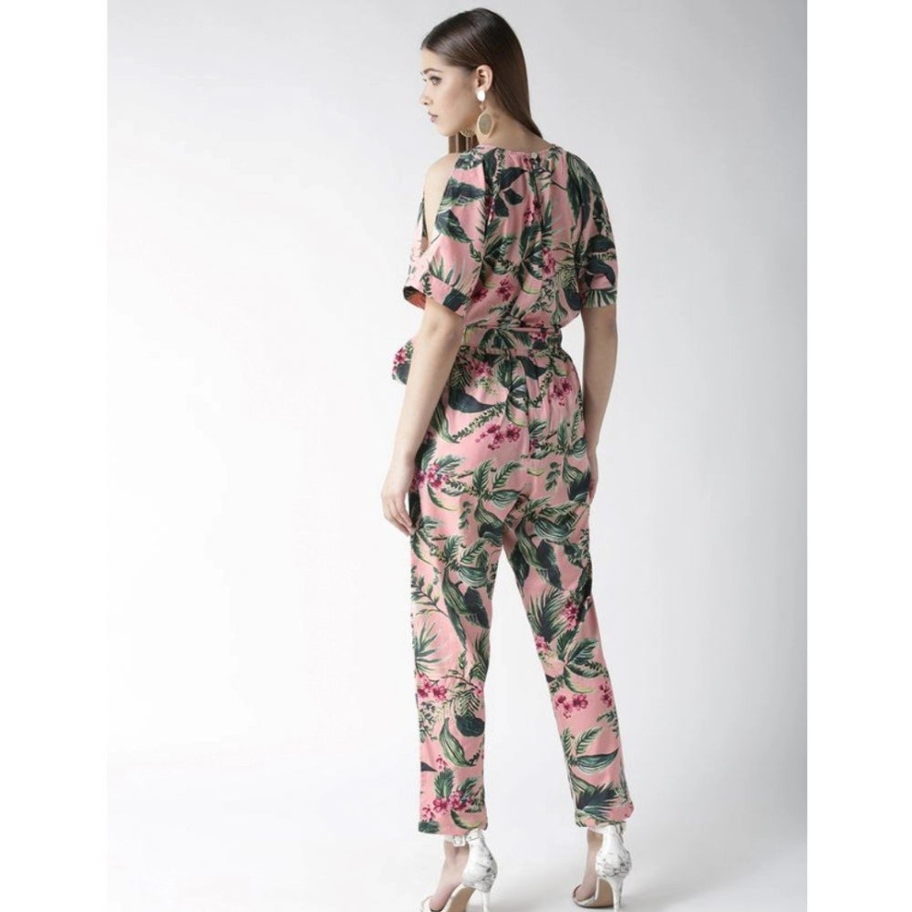 Pink polyester floral half-sleeve jumpsuit on model, vibrant floral pattern