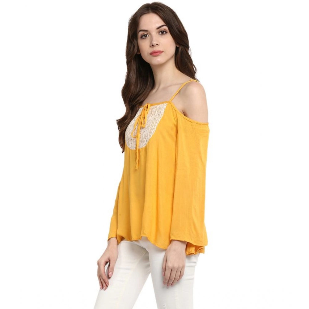 Mustard yellow rayon embellished cold shoulder top for women, close-up view