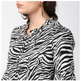 Black & White animal print bell sleeve top on model, women's polyester fashion top with collar neckline
